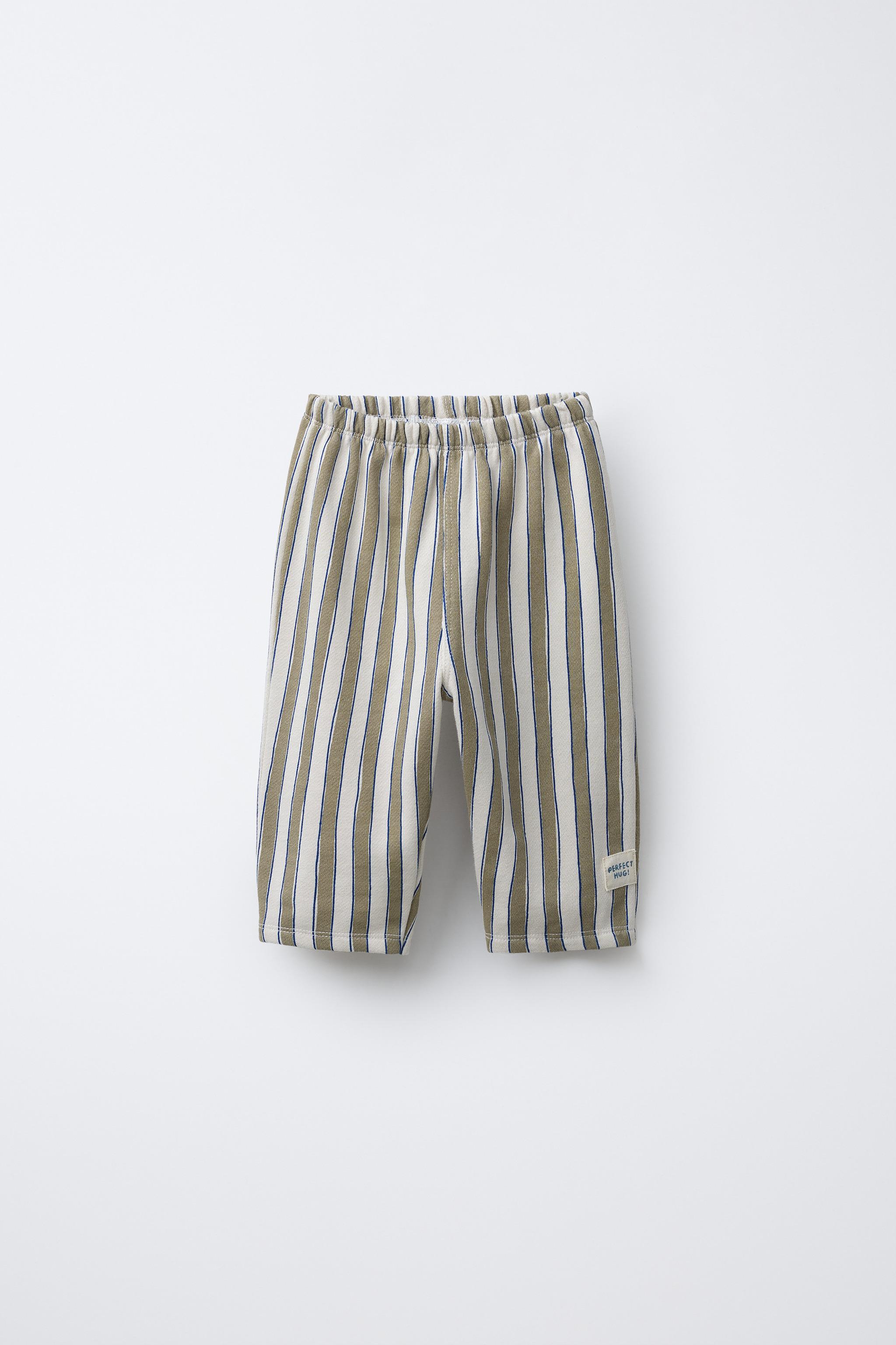 STRIPED BAGGY PANTS WITH LABEL